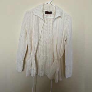 This is a white Bernic CREATIONS Wintuk acrylic open-knit cardigan. Vintage 70s